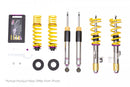 A set of KW V3 Coilovers for Toyota GR Corolla, displaying yellow springs, black and silver shock absorbers, adjustment tools and rebound and compression damping adjustability.